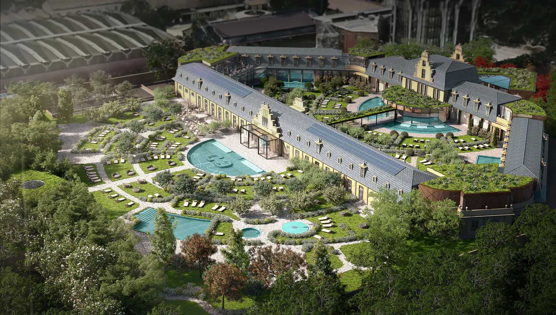 Aerial view of the DE MONTEL spa in Milan, with pools, gardens and a luxurious building. Enjoy the Milanese spa experience.